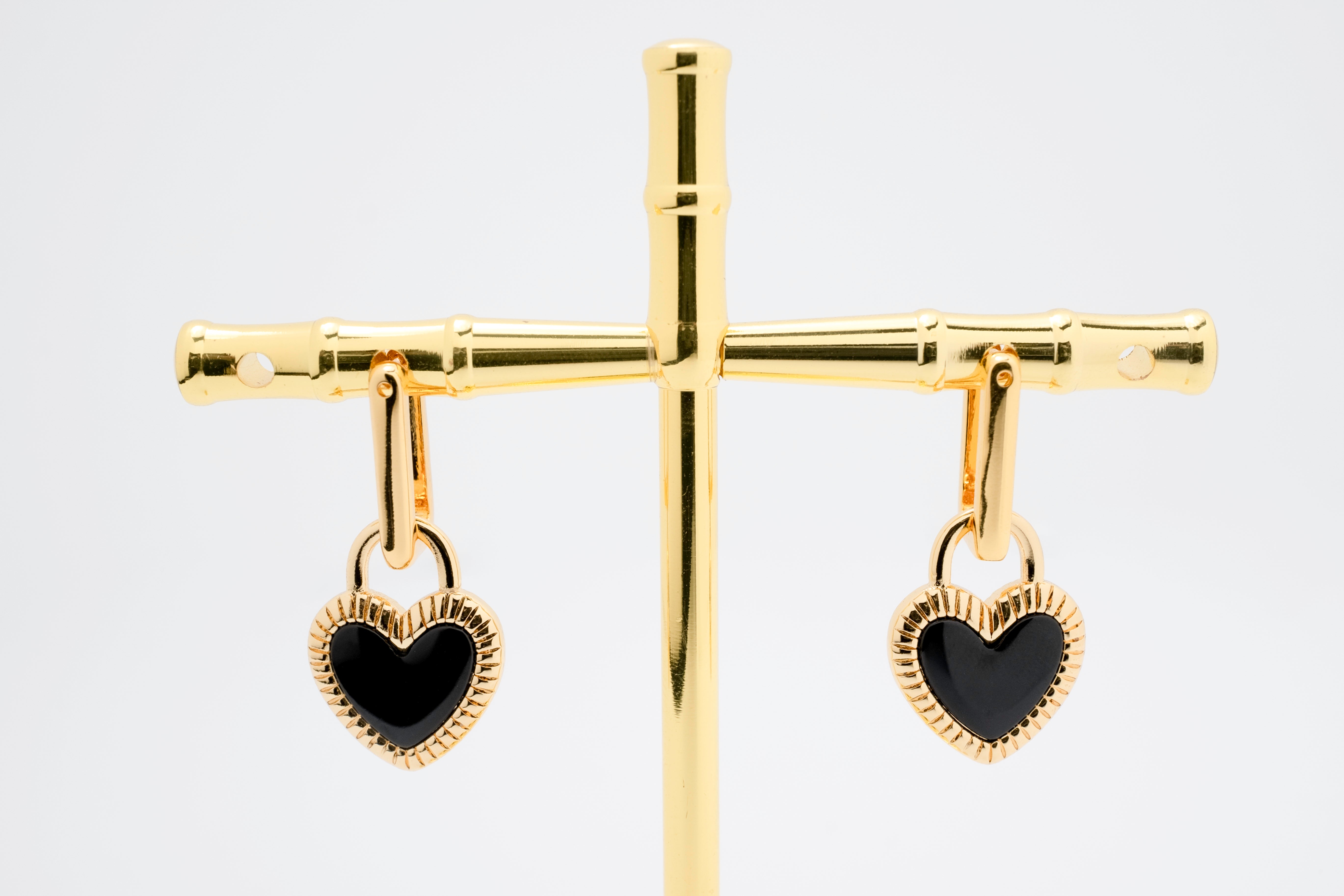 DuoCharm: Reversible Black & White Enamel Heart Earrings