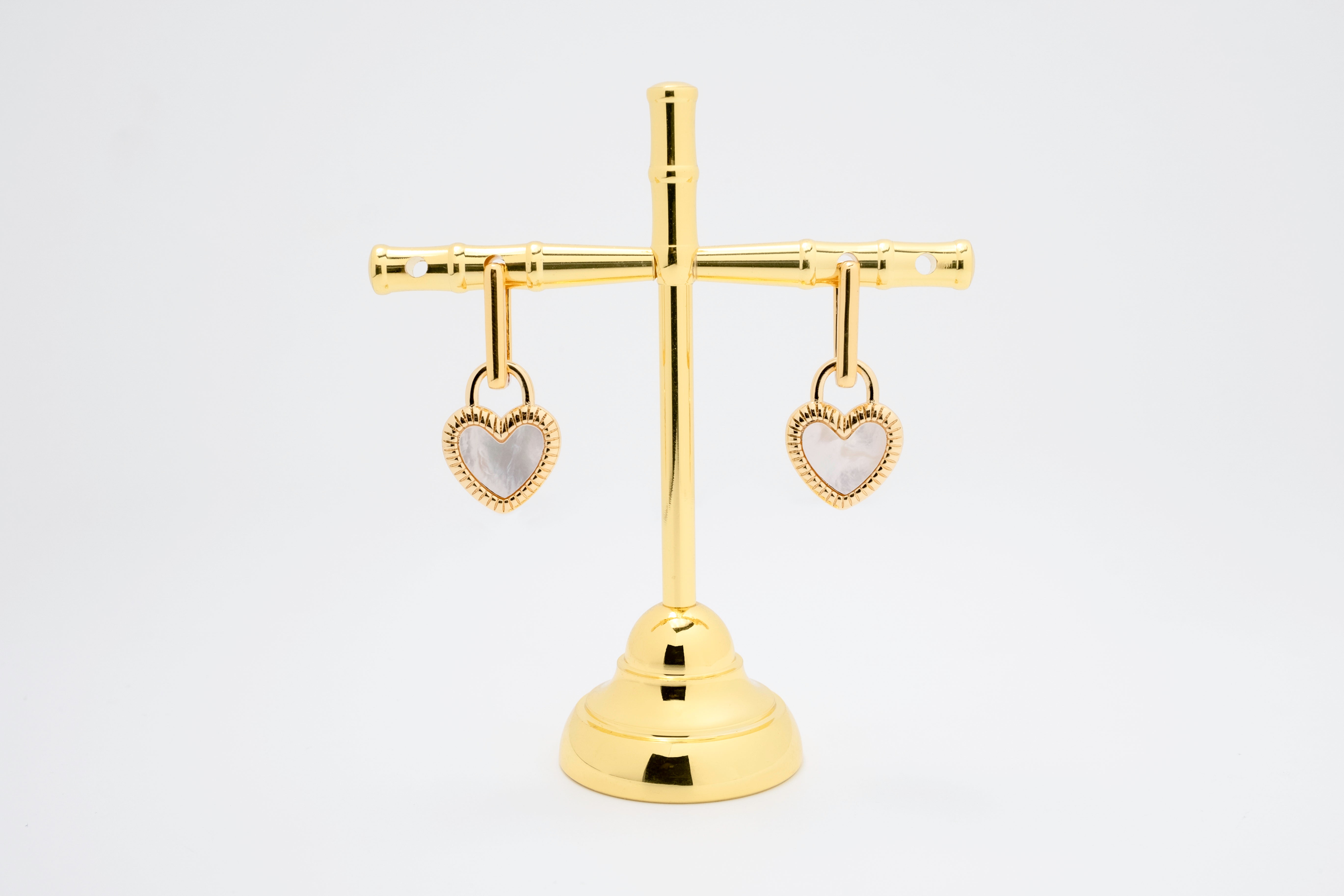 DuoCharm: Reversible Black & White Enamel Heart Earrings