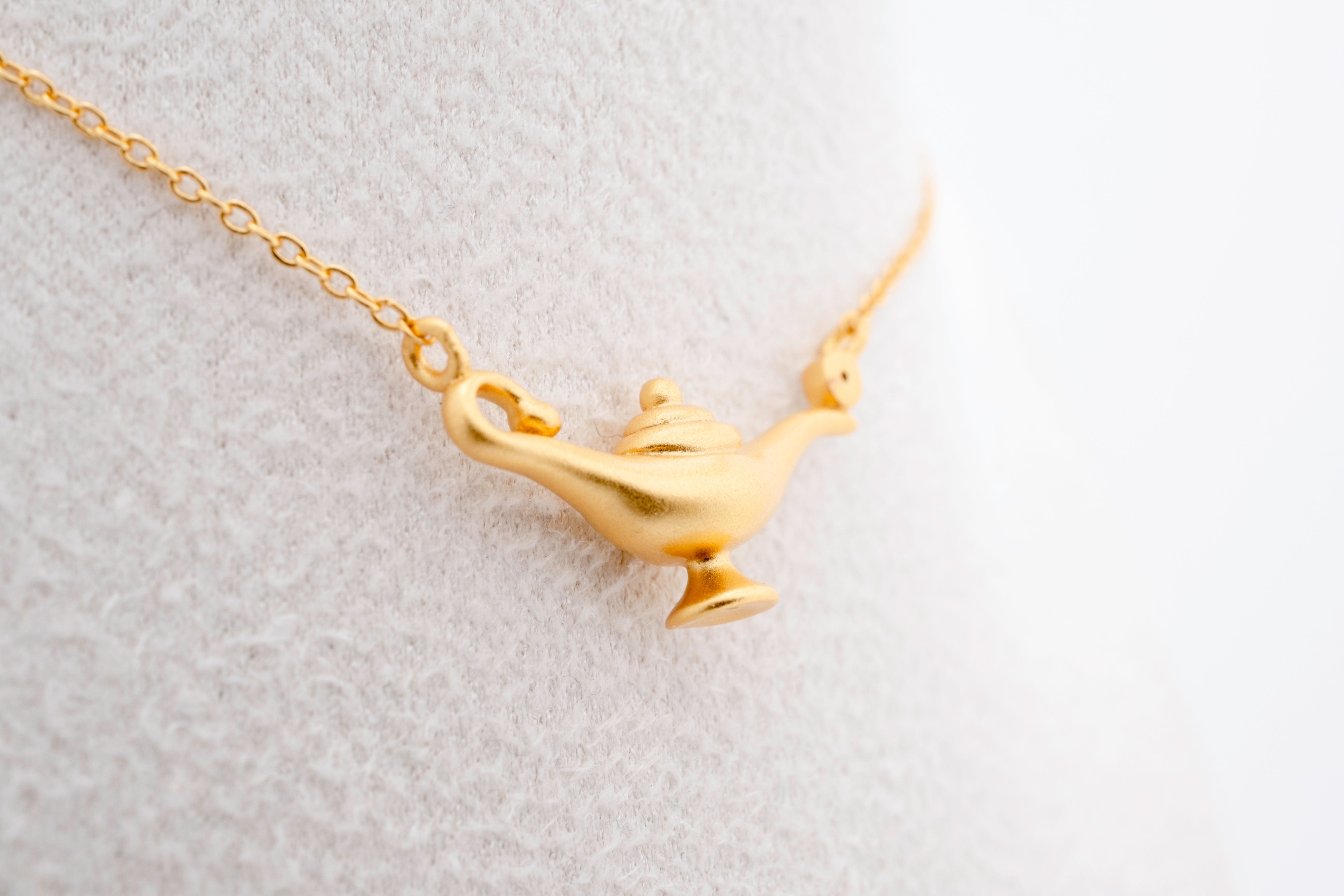 Wishbound: Gold Magic Lamp Necklace